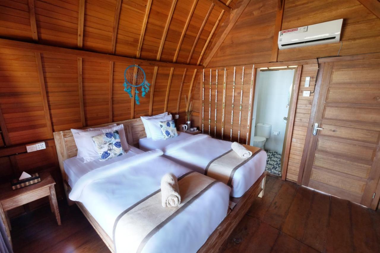 Adara Beach Huts Batununggul ภายนอก รูปภาพ