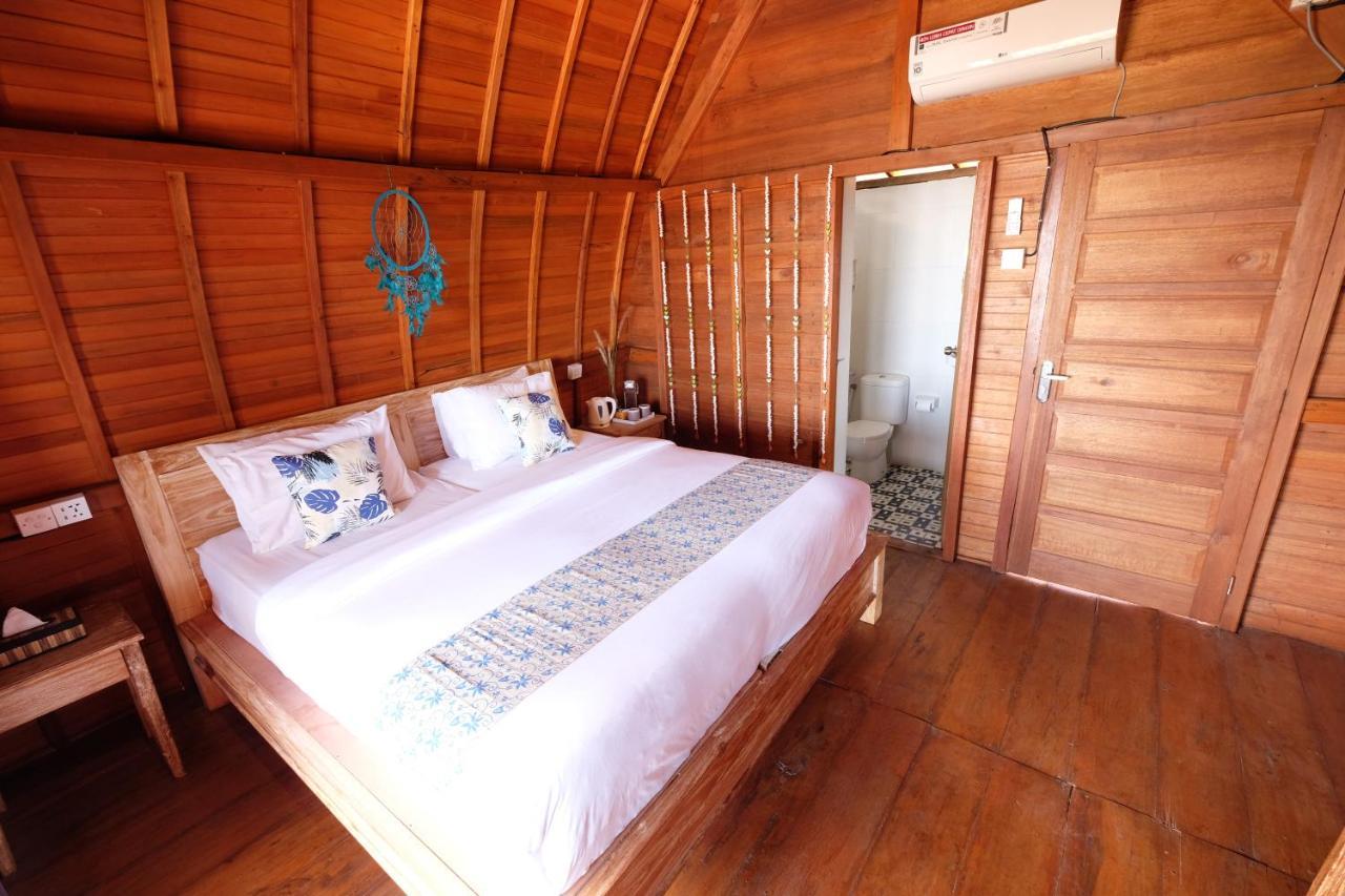 Adara Beach Huts Batununggul ภายนอก รูปภาพ