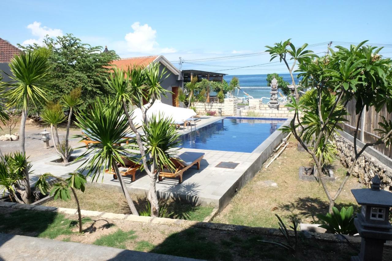 Adara Beach Huts Batununggul ภายนอก รูปภาพ